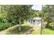 Quaint home with mature tree, offering shade and curb appeal at 1134 Cr 464, Lake Panasoffkee, FL 33538