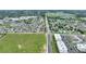Detailed aerial shot displaying the property's position amidst a bustling suburban landscape at 120 Citrus Isle St, Davenport, FL 33837