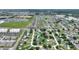 An aerial view highlights the property's location in a developing residential community at 120 Citrus Isle St, Davenport, FL 33837