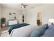 Comfortable bedroom featuring a well-made bed, ensuite bathroom and a walk-in closet at 120 Citrus Isle St, Davenport, FL 33837