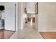 Hallway featuring tile flooring and view of the living room at 1216 Cheshire St, Groveland, FL 34736