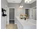 Bright bathroom with double sinks, generous counter space, and modern fixtures at 13108 Serene Glade Rd, Winter Garden, FL 34787