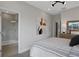 Contemporary main bedroom showcasing ensuite bathroom with tiled walk-in shower and modern fixtures at 13108 Serene Glade Rd, Winter Garden, FL 34787
