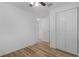 Bedroom featuring neutral walls and a ceiling fan, with closet at 1421 E Schwartz Blvd, The Villages, FL 32159