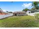 Spacious backyard with a patio area, perfect for outdoor entertaining and relaxation at 149 Shiloh Ave, Lady Lake, FL 32159