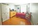 Inviting bedroom with wood floors and cozy furnishings at 15349 Lafite Ln, Clermont, FL 34714