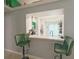 Charming pass-through kitchen bar featuring seating and direct access to the kitchen at 15349 Lafite Ln, Clermont, FL 34714
