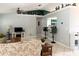 Spacious living room showcasing the tile flooring, open layout, and living space at 15349 Lafite Ln, Clermont, FL 34714