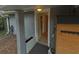 A back entrance to the home, with storage and outside hose at 1610 Williams Ave, Eustis, FL 32726
