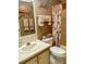 Bathroom with sink, vanity, decorative floral shower curtain, and matching accents at 163 Sweet Cir, Winter Haven, FL 33884