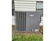 A side view of the GrandAire HVAC system at 163 Sweet Cir, Winter Haven, FL 33884