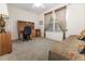 This bedroom features a desk, a chair, and a bed at 1654 Blossom Ter, The Villages, FL 32162