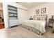 Comfortable bedroom with carpet, ceiling fan, double closet and a quaint furniture set at 1654 Blossom Ter, The Villages, FL 32162