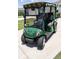 Golf cart for easy access to the golf course and community amenities and to drive around in style at 1654 Blossom Ter, The Villages, FL 32162