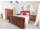 Comfortable bedroom with carpet, ceiling fan, and furnishings at 1654 Blossom Ter, The Villages, FL 32162