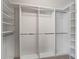Walk-in closet featuring a built-in closet system with shelves and clothing rods at 1889 Union Pl, The Villages, FL 32162