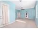 Expansive bedroom with multiple doorways and windows, perfect for a versatile layout at 21312 Marsh View Ct, Clermont, FL 34715