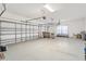 Spacious three-car garage with automatic door openers and plenty of storage space at 21312 Marsh View Ct, Clermont, FL 34715
