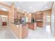 Spacious kitchen boasts stainless appliances, granite counters, and ample cabinet space at 21312 Marsh View Ct, Clermont, FL 34715
