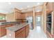 Kitchen boasts stainless appliances, granite countertops, and a convenient center island at 21312 Marsh View Ct, Clermont, FL 34715