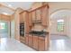 Well-equipped kitchen with modern appliances, granite counters, and ample storage at 21312 Marsh View Ct, Clermont, FL 34715