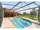 Enjoy this private screened-in pool, perfect for relaxation and outdoor entertainment at 21312 Marsh View Ct, Clermont, FL 34715
