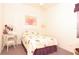 Bright bedroom with wicker vanity and furniture, natural light, and cozy decor create a serene retreat at 22125 Draw Bridge Dr, Leesburg, FL 34748