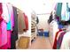This walk-in closet offers generous storage with shelves, drawers, and hanging space for organization at 22125 Draw Bridge Dr, Leesburg, FL 34748