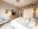 Well-lit bedroom with a large closet and neutral decor at 2299 Twickingham Ct, Clermont, FL 34711