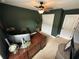 Functional home office with a large desk, comfortable chair, and ample storage, ideal for productivity at 295 Whirlaway Drive, Davenport, FL 33837