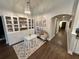 Cozy playroom with built-in shelves, a small table and chairs, and an elegant chandelier at 295 Whirlaway Drive, Davenport, FL 33837