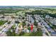 Aerial view of a charming neighborhood, highlighting the home's location and community layout at 32942 Rambling Oaks Ct, Leesburg, FL 34748