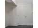 Hallway featuring a louvered closet and interior door at 32942 Rambling Oaks Ct, Leesburg, FL 34748