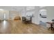 Open floor plan with a view of the kitchen and dining area at 32942 Rambling Oaks Ct, Leesburg, FL 34748
