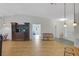 Spacious living room with wood floors and natural light at 32942 Rambling Oaks Ct, Leesburg, FL 34748