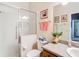 Bright bathroom with a glass-enclosed shower, toilet, vanity, and neutral colored walls at 3601 Mount Hope Loop, Leesburg, FL 34748