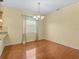 Dining room with a chandelier and light-colored walls at 3677 Serena Ln, Clermont, FL 34711