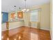 Dining room with a chandelier and tile floors at 3677 Serena Ln, Clermont, FL 34711