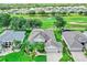 Gorgeous home situated on lush green golf course with scenic views and mature trees at 3681 Arlington Ridge Blvd, Leesburg, FL 34748