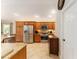 Well-appointed kitchen with stainless appliances, granite countertops, and an abundance of cabinet space at 3750 Raspberry Ct, The Villages, FL 32163