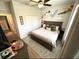 Charming bedroom featuring a whimsical Peter Pan mural, adding a playful and unique touch at 384 Summer Squall Rd, Davenport, FL 33837