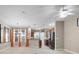 Bright open-concept living space seamlessly connecting the kitchen, dining, and living areas with plenty of space at 4814 Luge Ln, Orlando, FL 32839