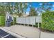 Community mailboxes with neatly landscaped surroundings and a bulletin board for residents at 4814 Luge Ln, Orlando, FL 32839