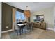Elegant dining room featuring stylish lighting and a modern aesthetic at 5177 Blanket Flower St, Apopka, FL 32712