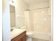 A full bathroom with a shower and vanity at 651 Timbercrest Dr, Leesburg, FL 34748