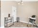 Light-filled dining area with pendant lighting and easy access to a pantry at 7732 Sloewood Dr, Leesburg, FL 34748