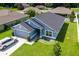 Inviting single-Gathering residence with manicured lawn, a two-car garage, and attractive curb appeal at 7732 Sloewood Dr, Leesburg, FL 34748