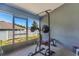 A screened in lanai with workout equipment at 7732 Sloewood Dr, Leesburg, FL 34748