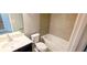 Full bathroom featuring a combined tub and shower with tiled wall at 1867 Holden Ridge Lane, Clermont, FL 34715