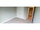 Bedroom with light gray walls and closet with double doors at 1867 Holden Ridge Lane, Clermont, FL 34715
